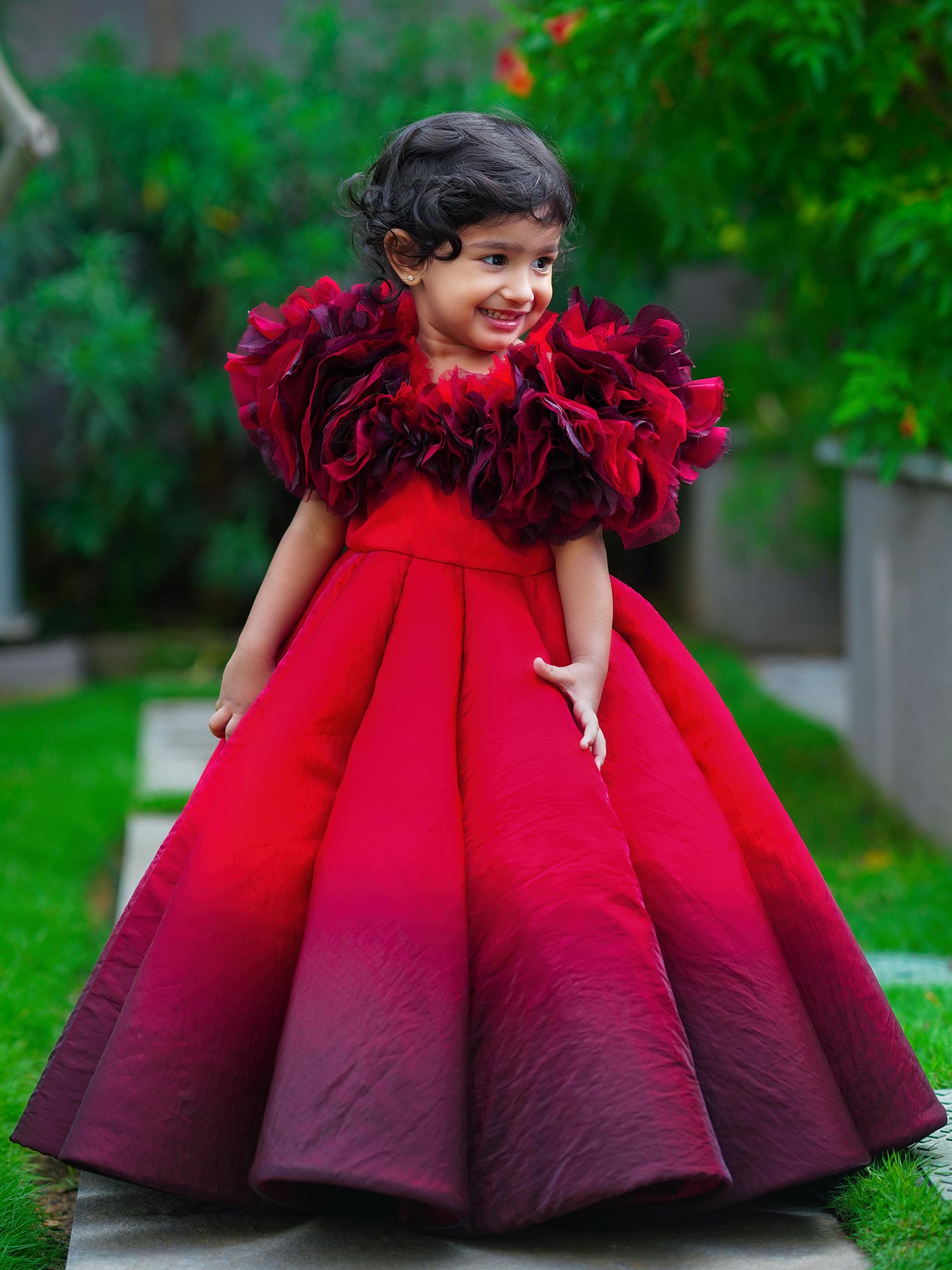 Shaded Red Couture Gown With Hair Accessory