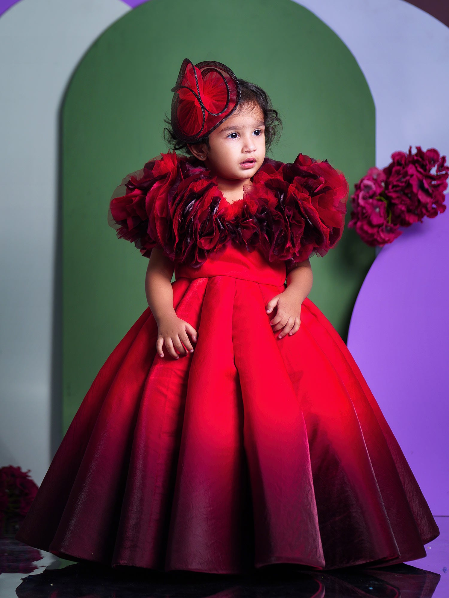 Shaded Red Couture Gown With Hair Accessory