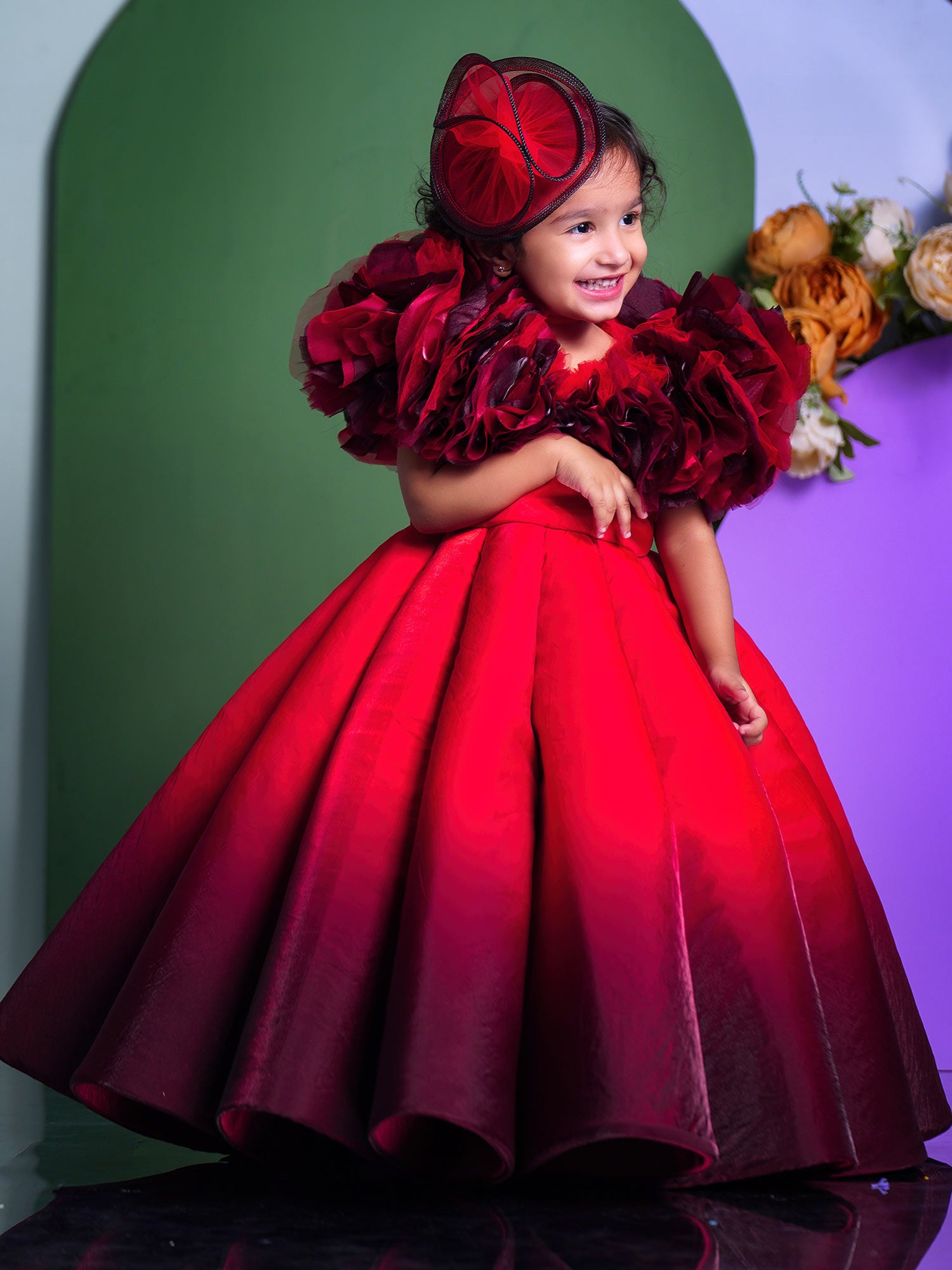 Shaded Red Couture Gown With Hair Accessory