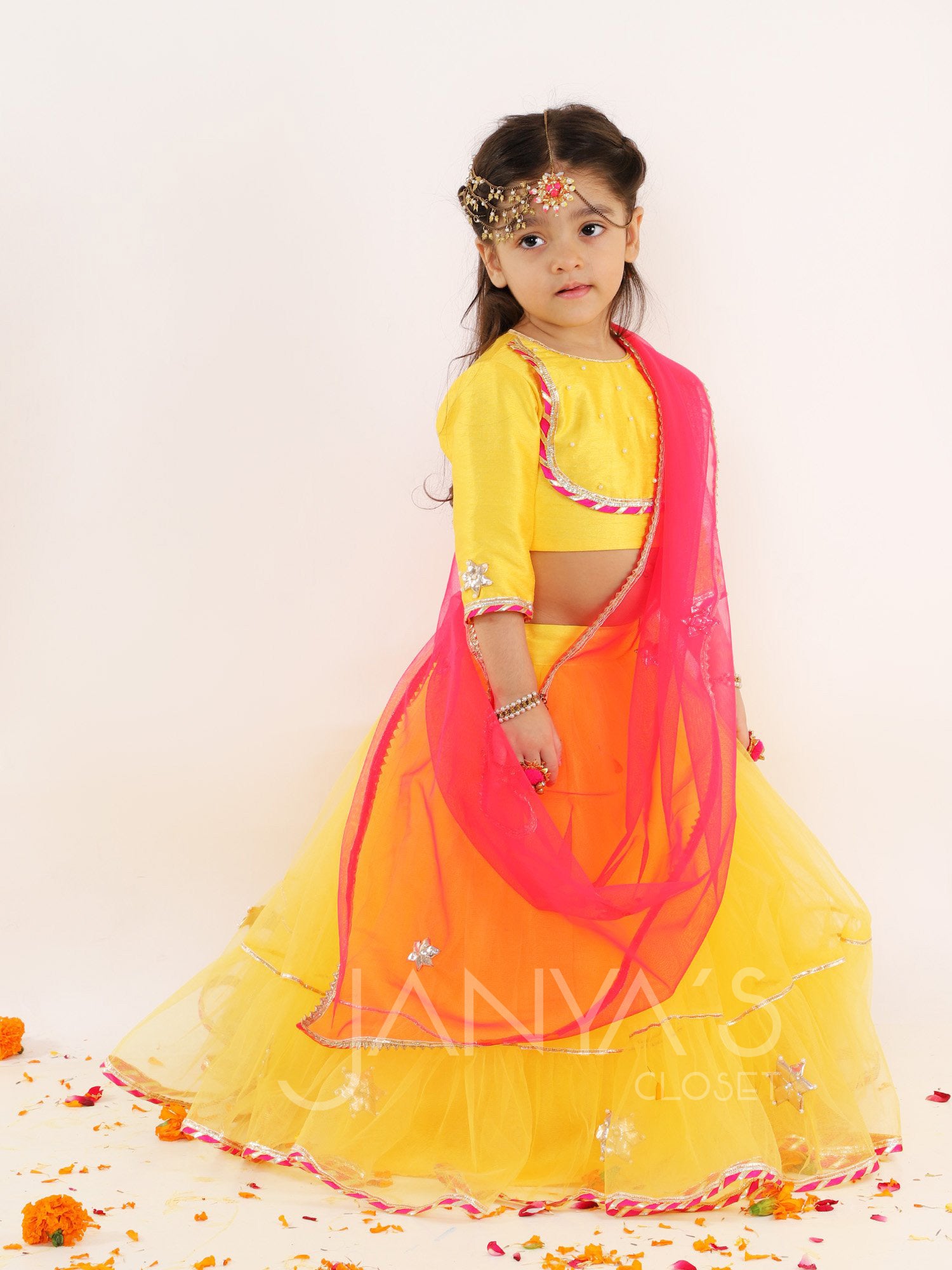 Yellow Net Lehnga Set With Pink Dupatta