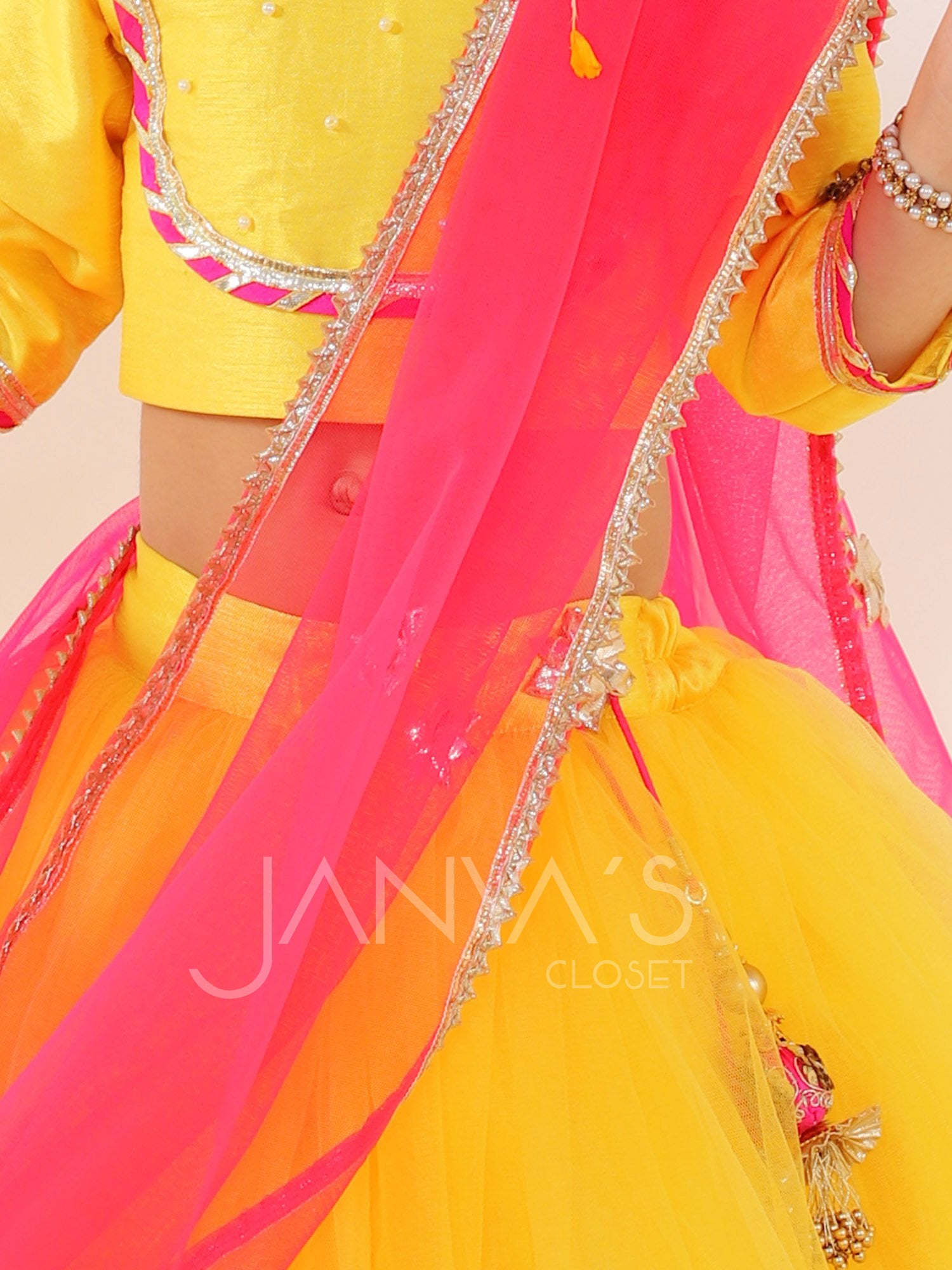 Yellow Net Lehnga Set With Pink Dupatta