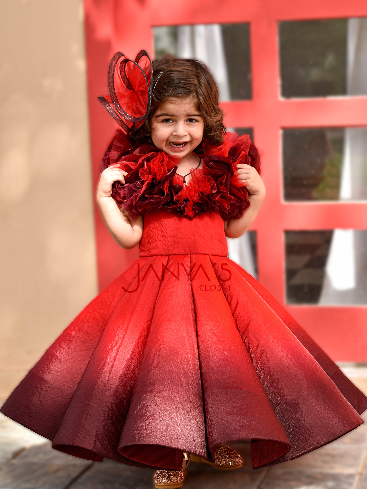 Shaded Red Couture Gown With Hair Accessory